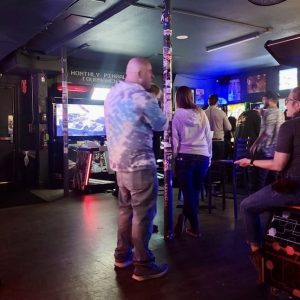 People standing in arcade