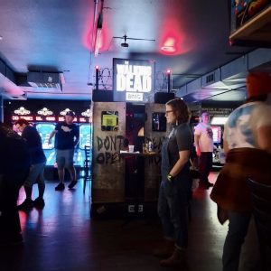 Another angle of this arcade with pinball machines and ski-ball in the background
